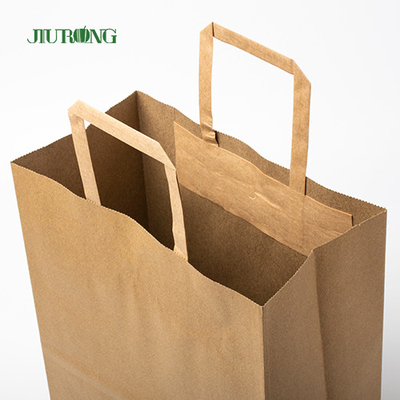 Borsa di carta kraft di SOS Brown con l'imballaggio per alimenti riciclato maniglia del pranzo